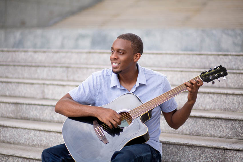student playing guitar
